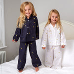 Load image into Gallery viewer, Limited Edition White Cotton Pyjamas with Gold Stars
